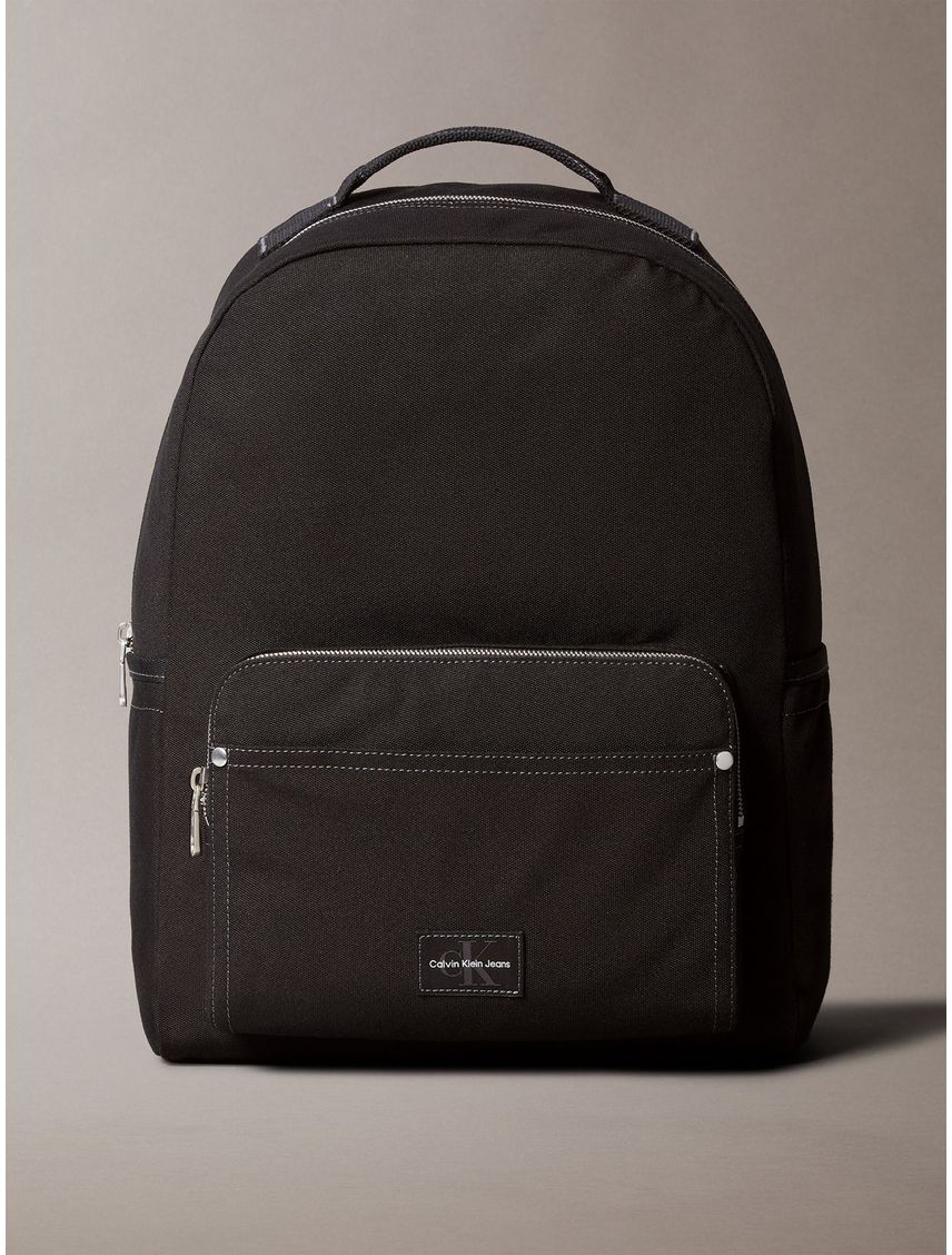 Morral negro redondo con etiqueta tejida