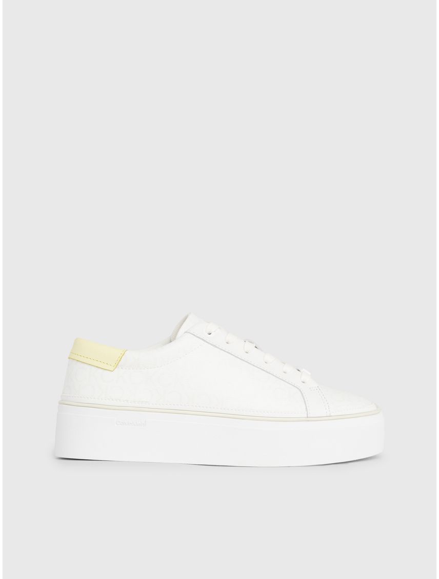 Tenis blanco blanco con plataforma y monograma