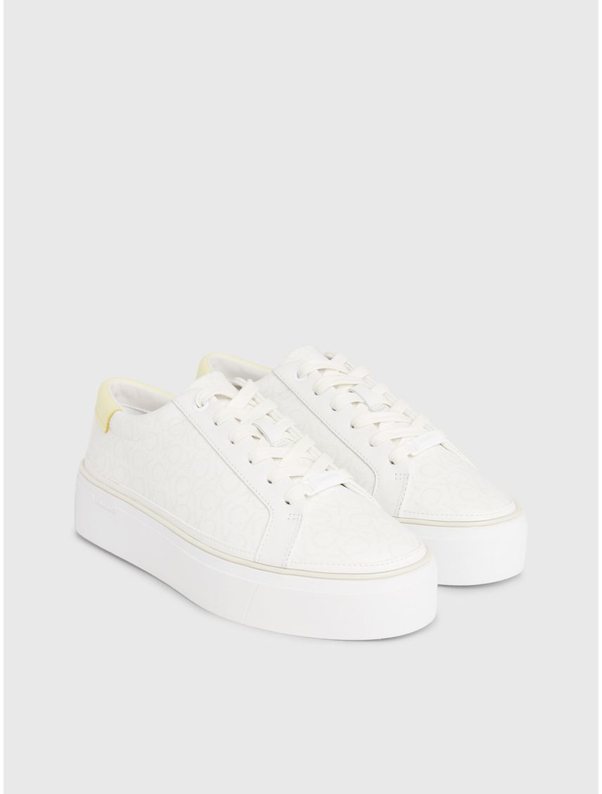 Tenis blanco blanco con plataforma y monograma