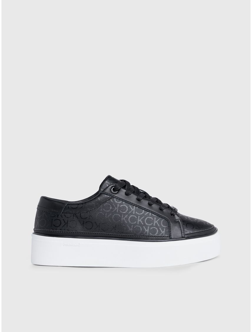 Tenis negro negro con plataforma y monograma