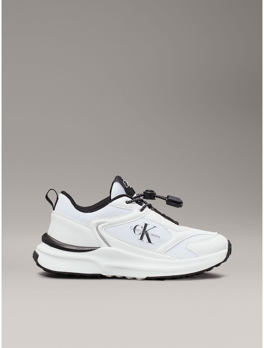 Tenis blanco sin cordones para niño