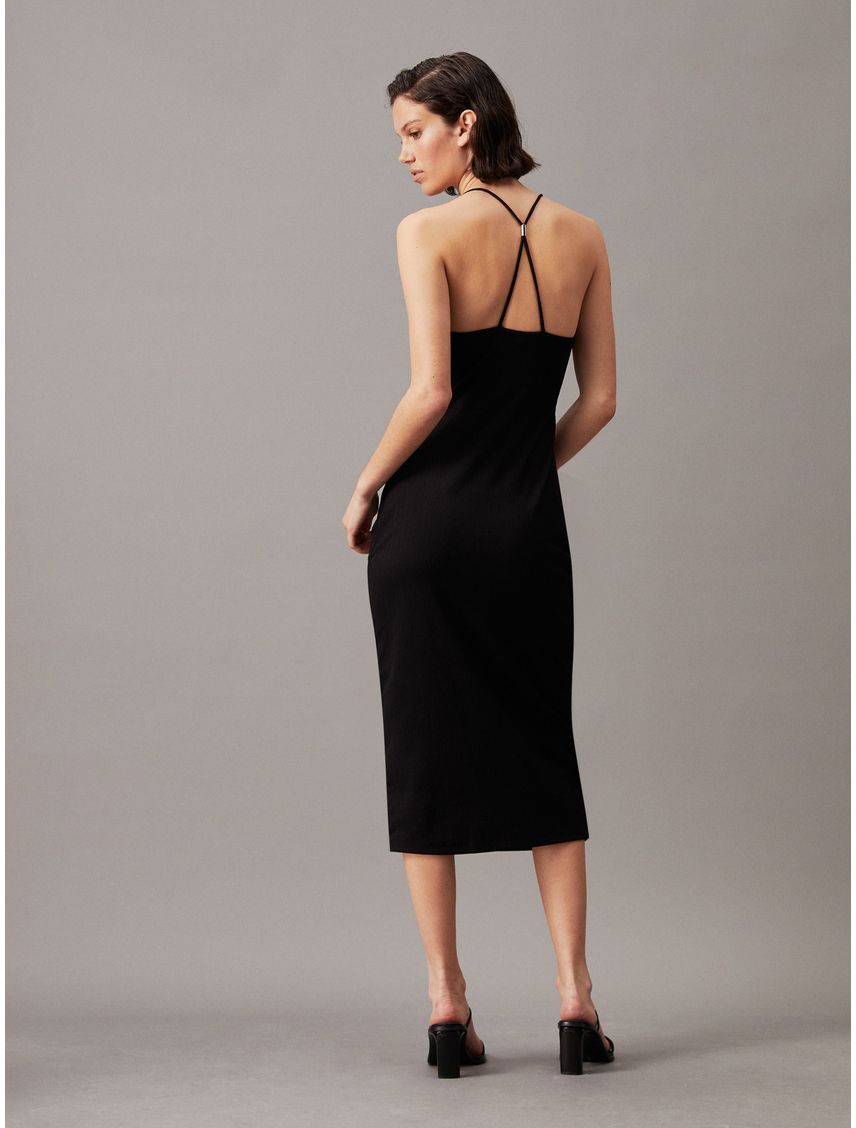 Vestido negro midi recortado con detalle de lazo