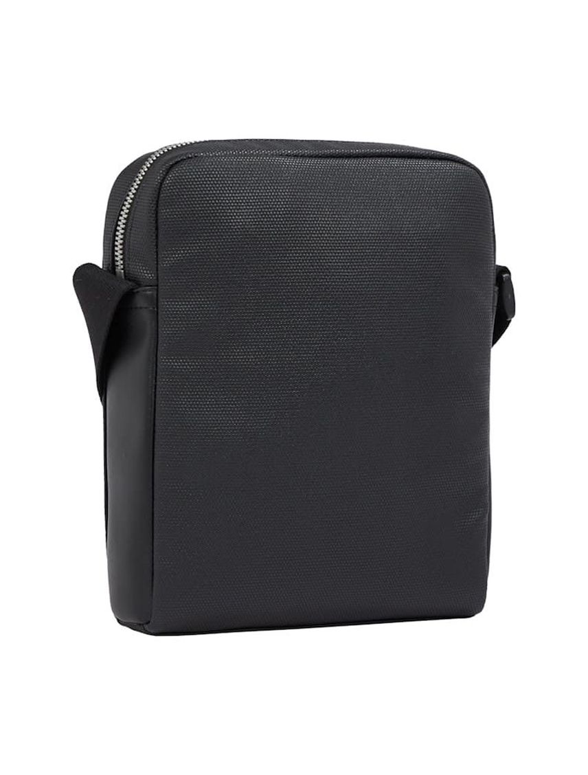 Bolso negro reporter con insignia