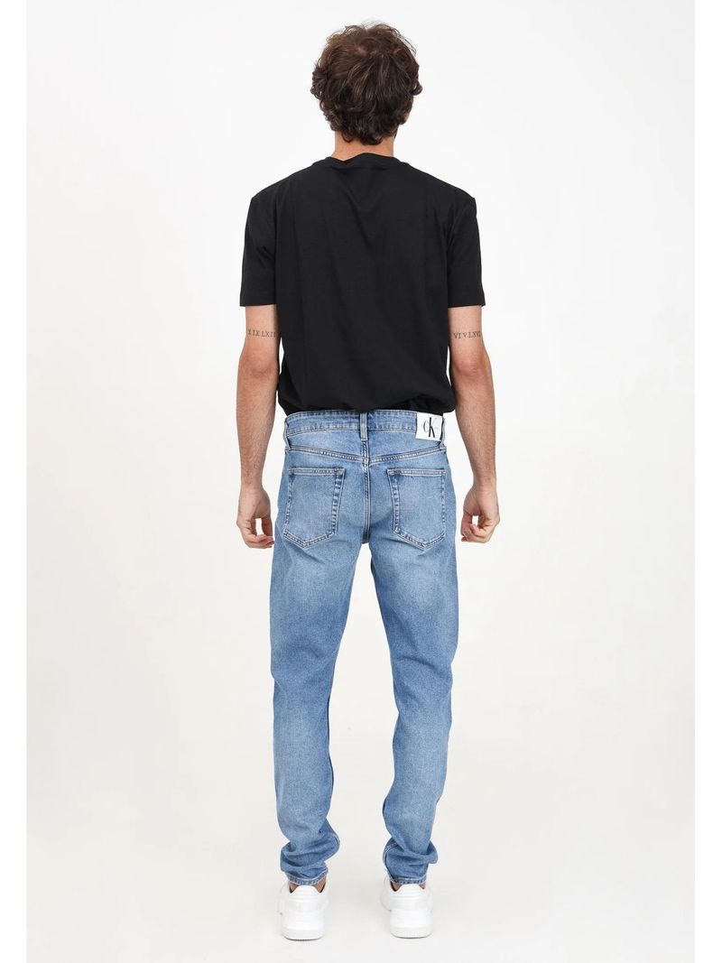 jeans-azul-slim-taper-efecto-destenido