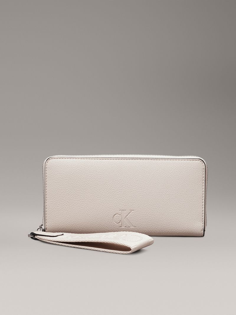 billetera-beige-cremallera-en-contorno