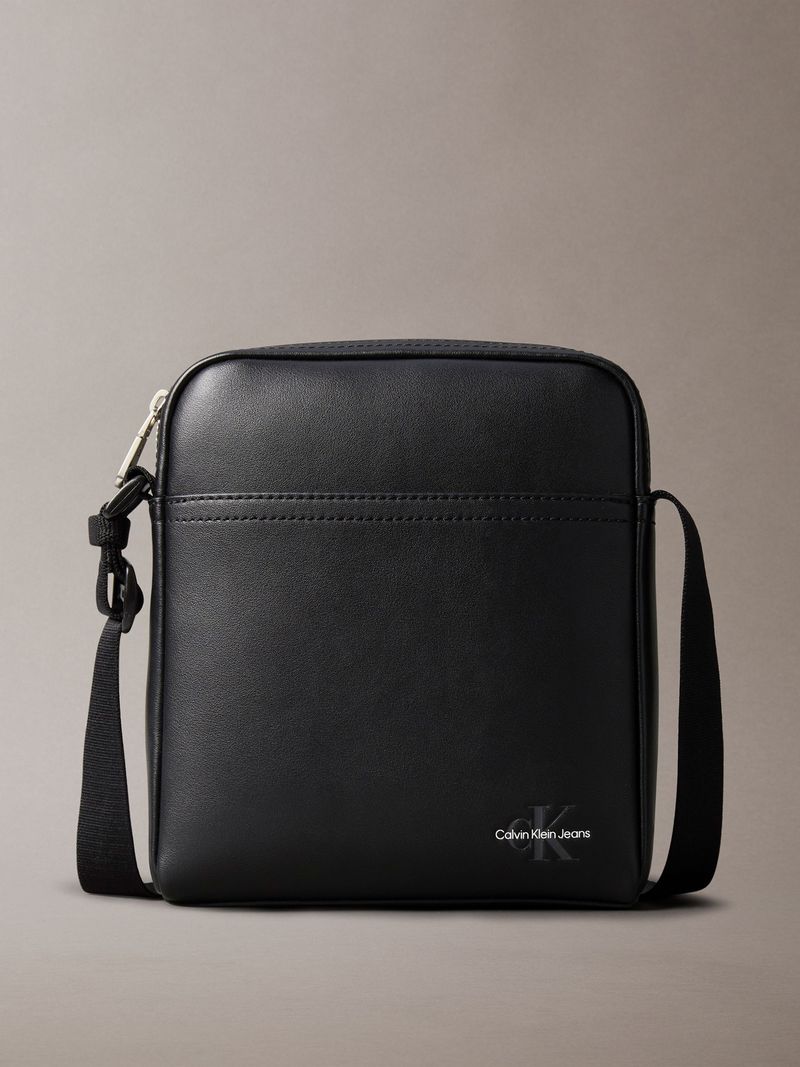 bolso-negro-reporter-logotipo