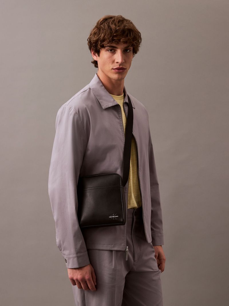 bolso-negro-reporter-logotipo