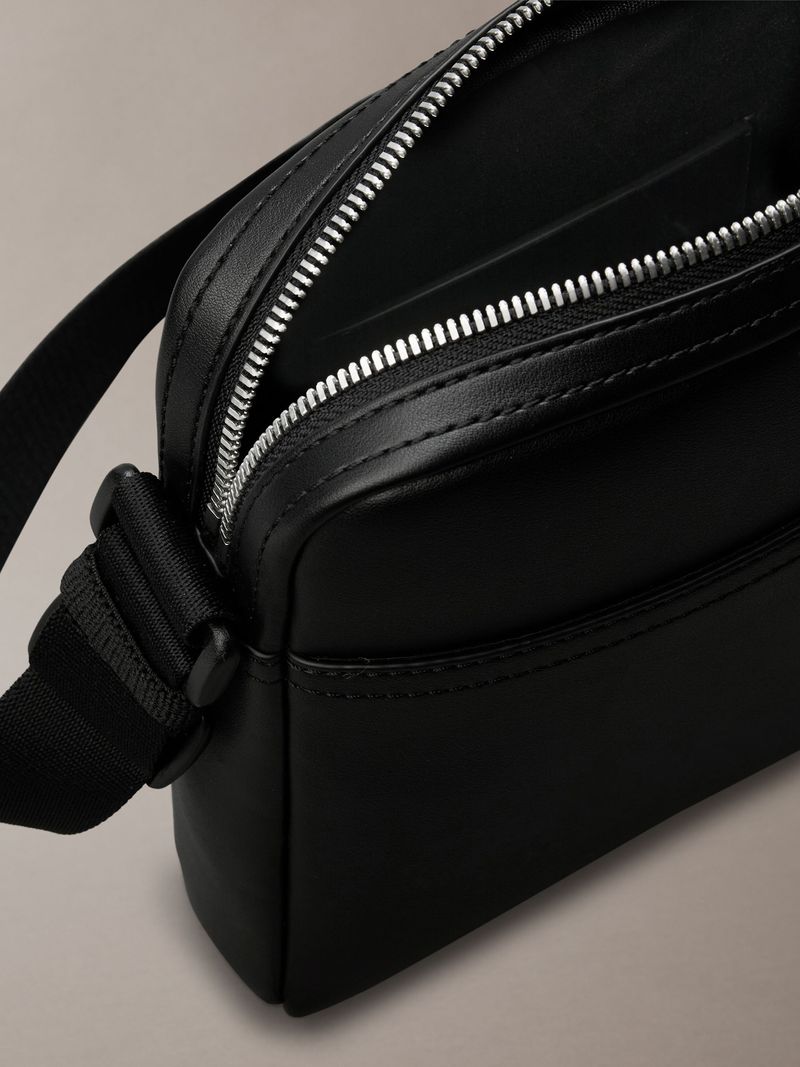 bolso-negro-reporter-logotipo