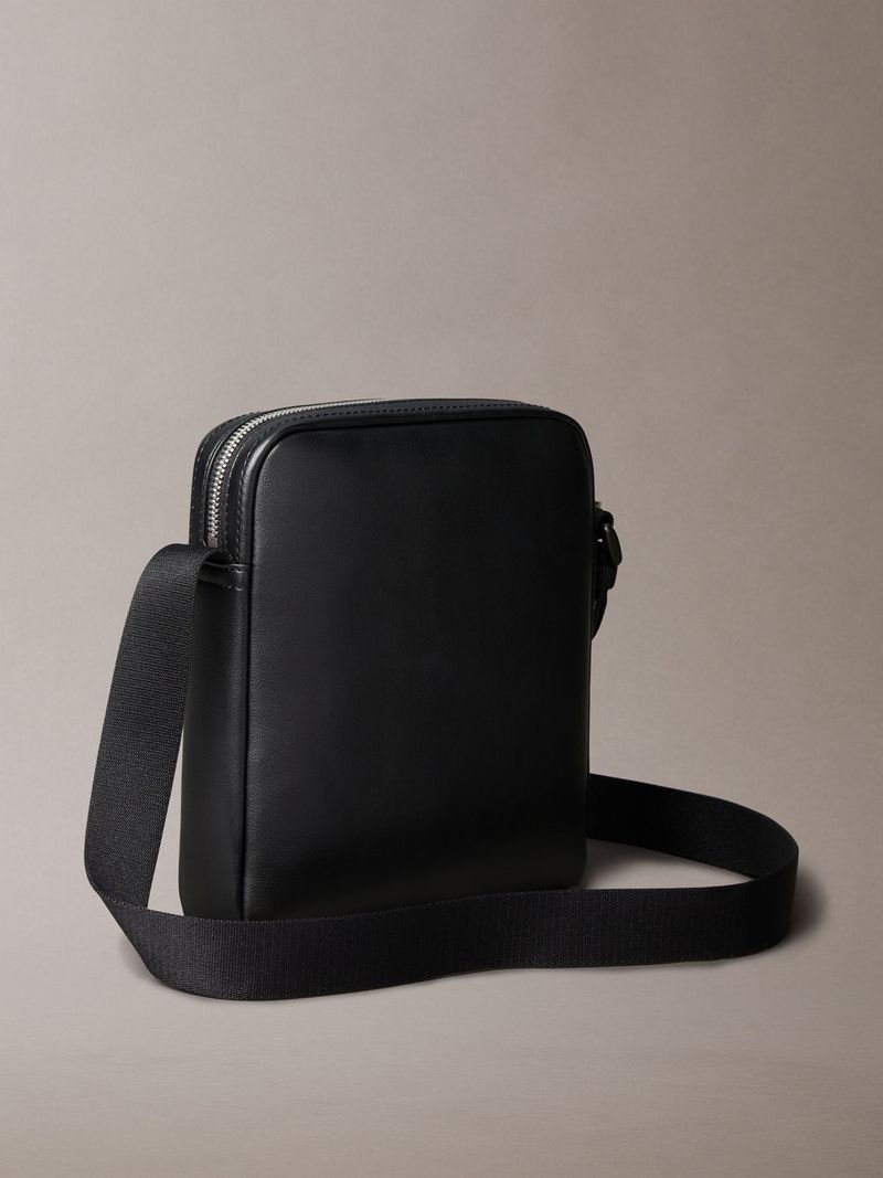 bolso-negro-reporter-logotipo