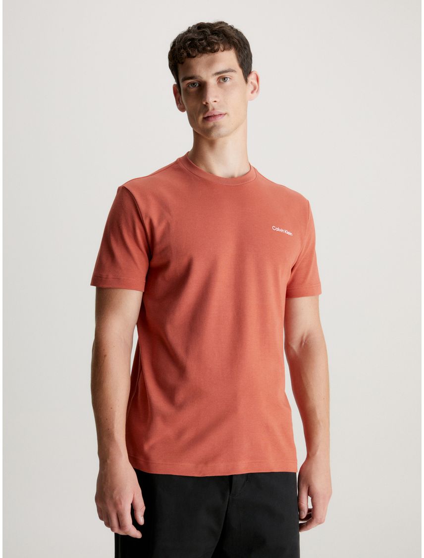 Camiseta naranja con micro logo