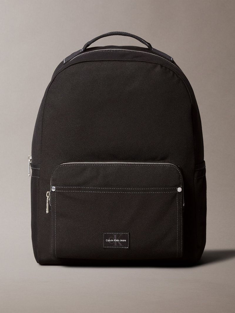 morral-negro-redondo-etiqueta-tejida