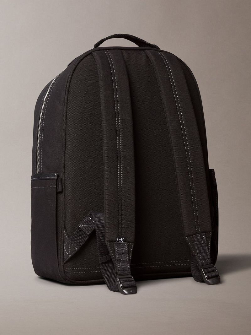 morral-negro-redondo-etiqueta-tejida