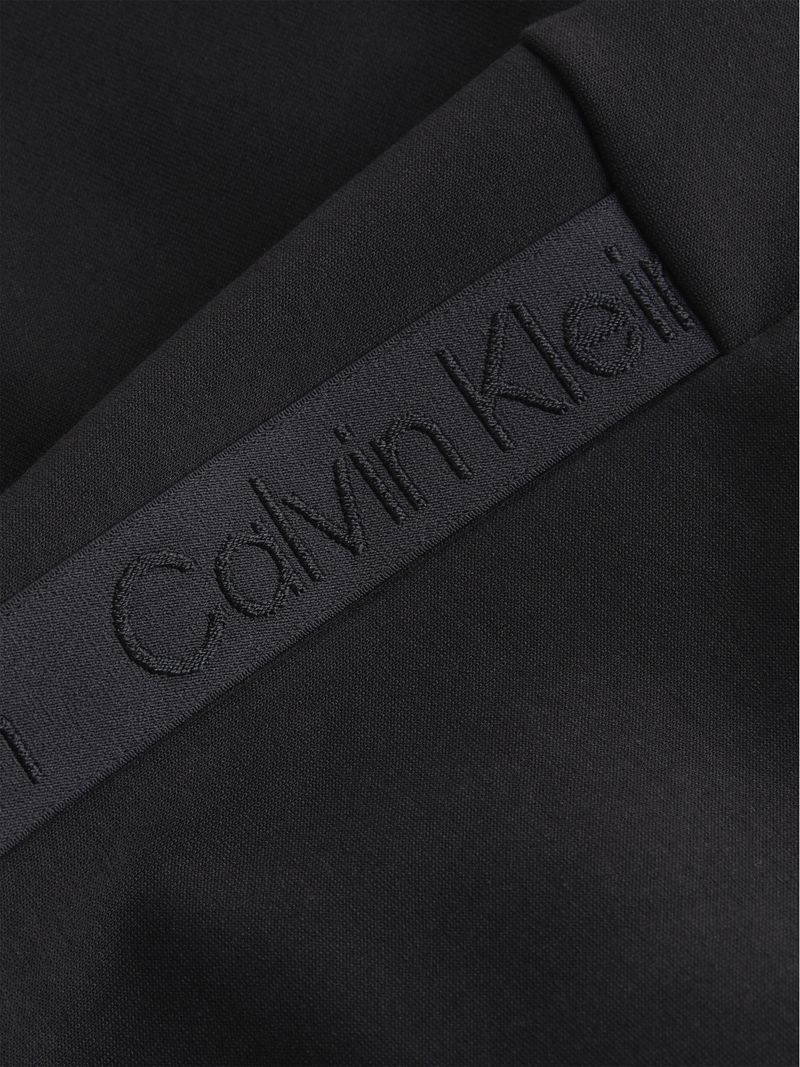 jogger-negro-raised-con-logo-tape