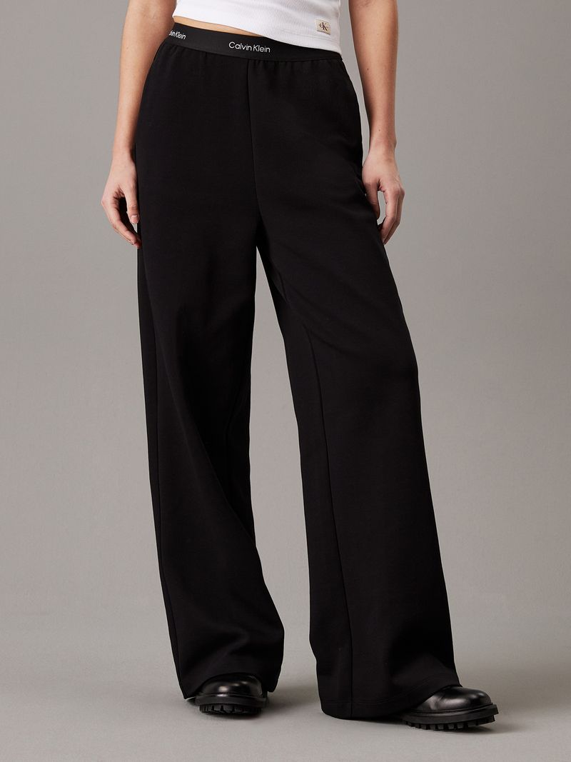 pantalones-negro-pierna-ancha-cinta-logo