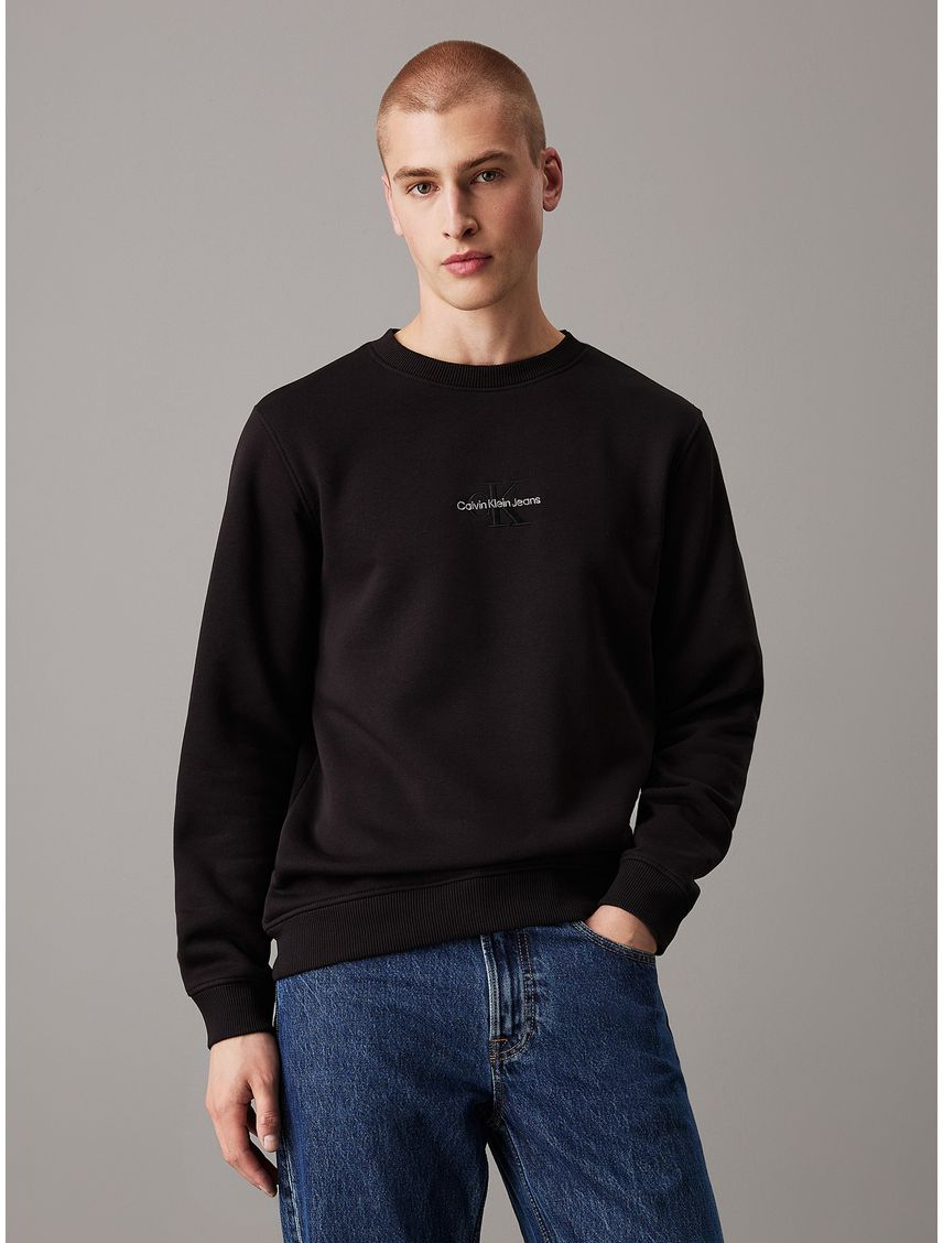 Saco negro de felpa con monograma