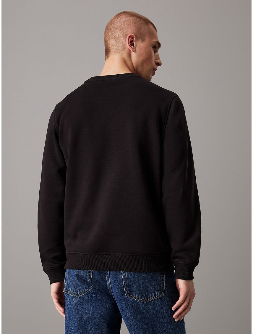 Saco negro de felpa con monograma