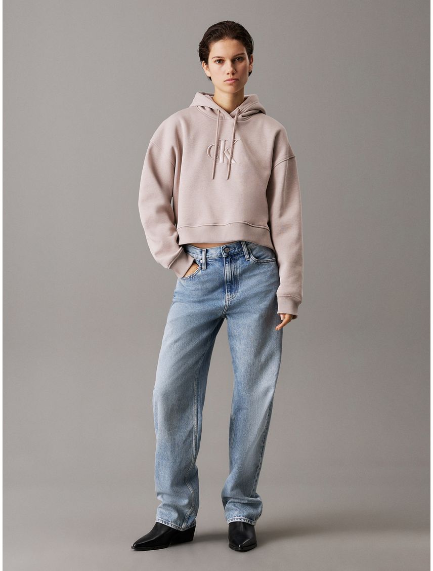 Buzo beige holgao con capota y monograma