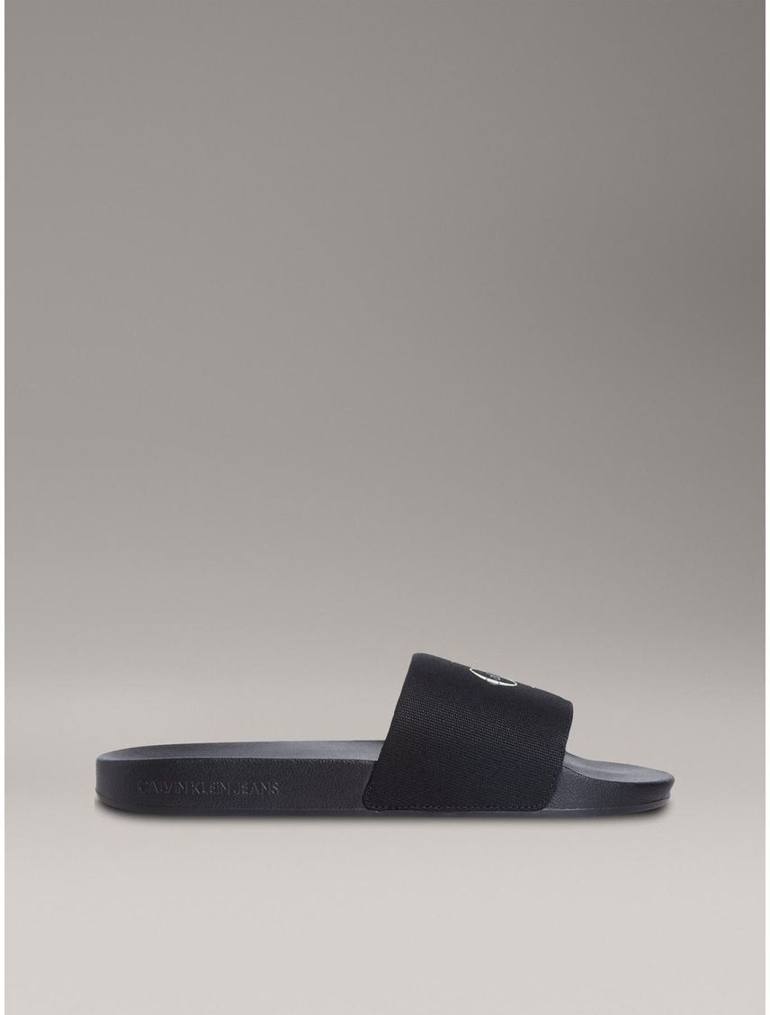 Sandalias negro deslizantes con monograma