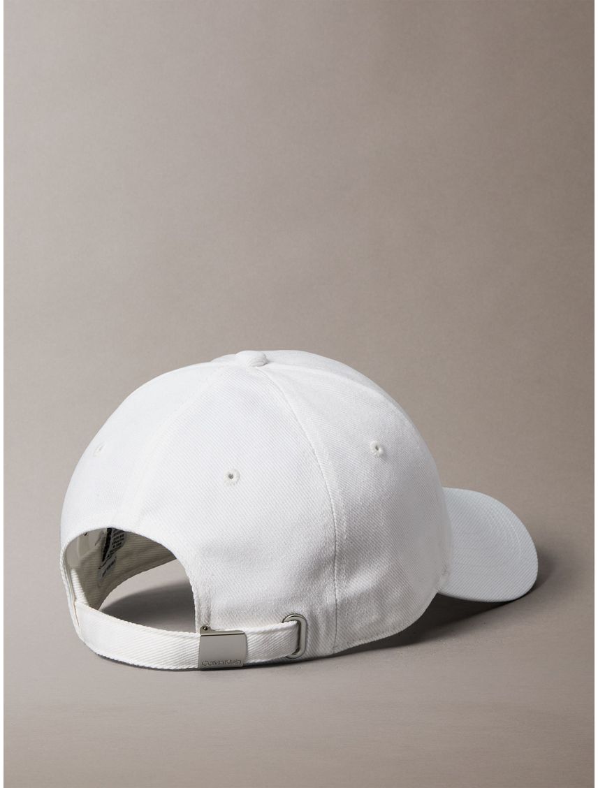 Gorra beige con monograma bordado