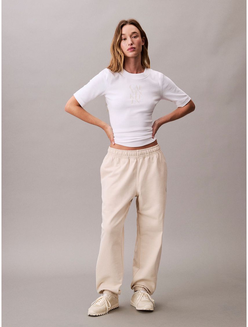 Jogger beige de felpa con monograma estampado