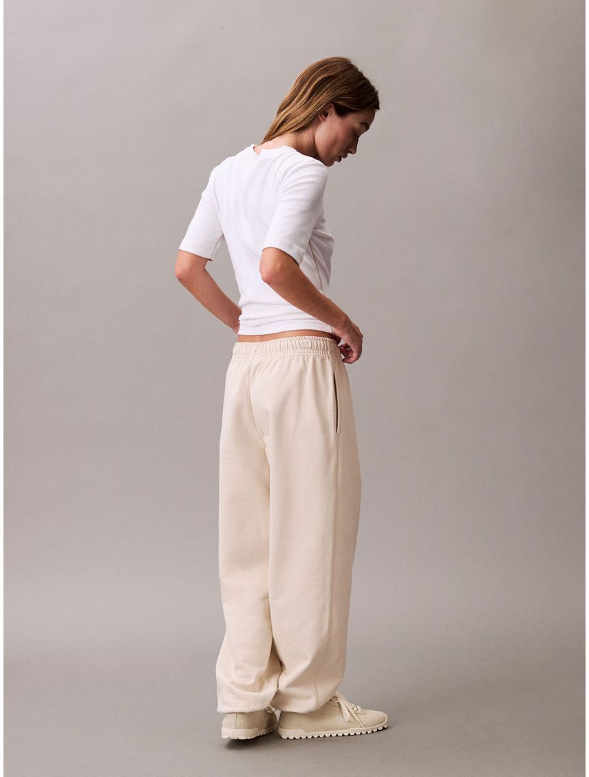 Jogger beige de felpa con monograma estampado