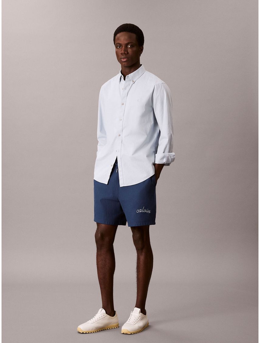 Pantaloneta azul de felpa con logotipo bordado