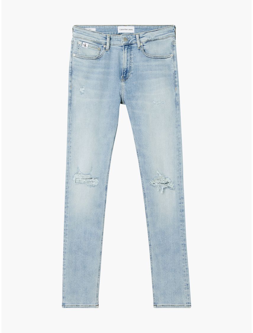 Jeans celeste skinny con detalles rasgados