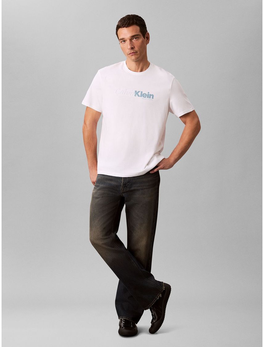 Camiseta blanca con estampado gráfico de logo en letra cursiva