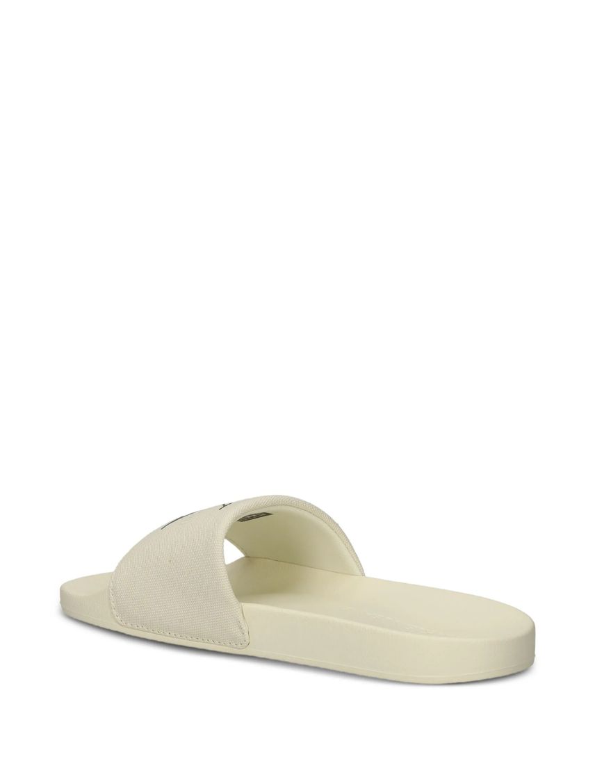 Sandalias beige slide con monograma